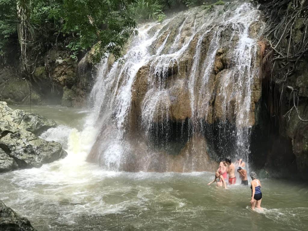 Swimming under the hot water fall Cascada El Paraíso Izabal