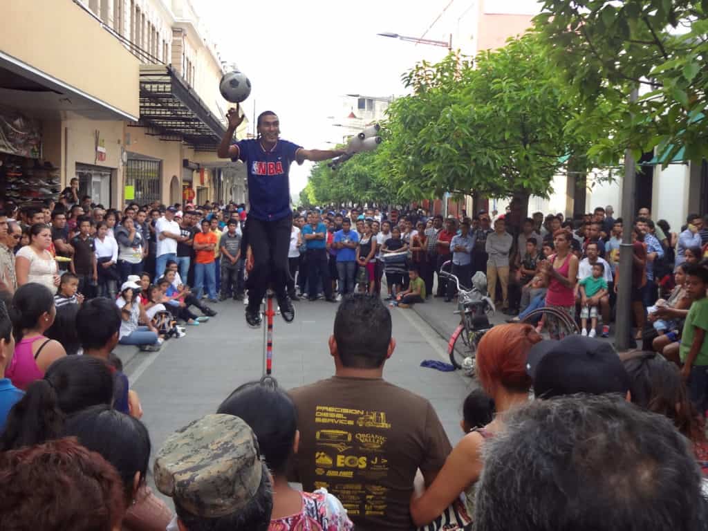 A street performer draws crowds in Zone 1 Guatemala City during the Festival Cultural