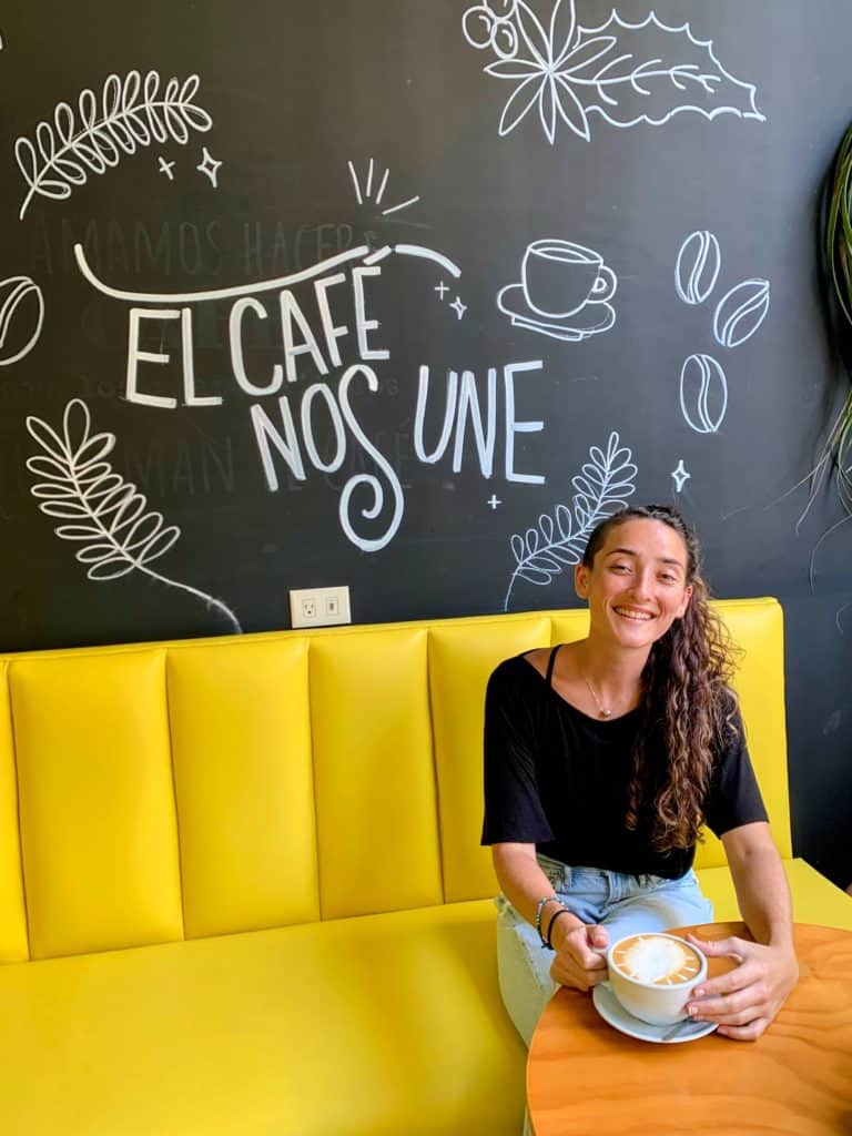 Woman enjoying a cappuccino at La Tacita in Zona 1 Guatemala City