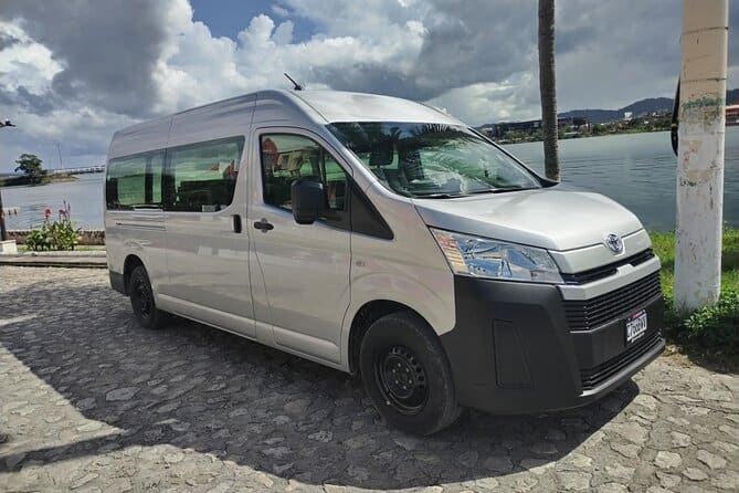 Sleek shuttle offering private transportation to Tikal from Flores